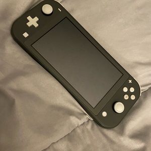 Nintendo Switch Lite. Like new condition. PRICE IS FIRM!!